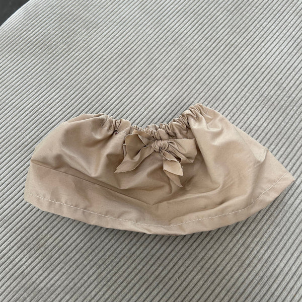 Strutskørt i beige med sløjfe