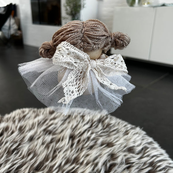 Den lille fede skytsengel Darma.