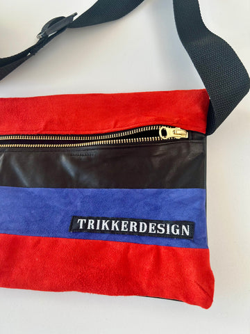 Crossbody/bæltetaske i skind og fake skind.