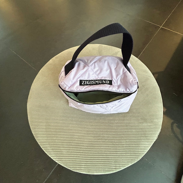 Toilet/makeup taske i lyselilla med shine.