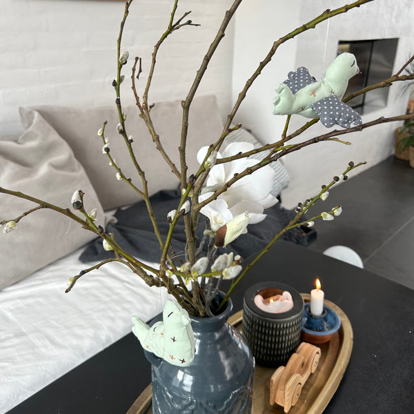 Ophæng med broderede vinger.