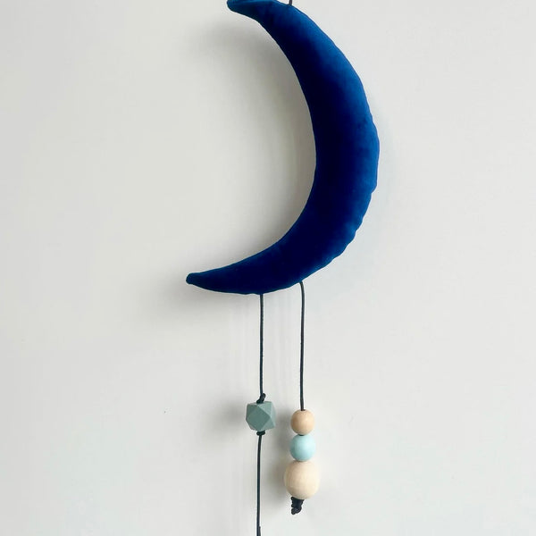 Uro med måne og stjerne i velour.