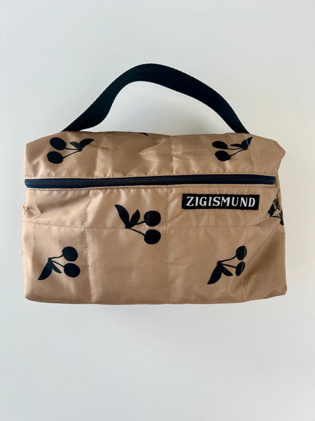 Rummelig toilettaske i beige med skønne kirsebær.