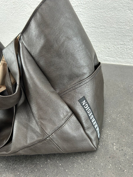 Brun læder shopper i genbrugs læder.