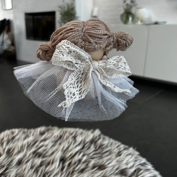 Den lille fede skytsengel Darma.