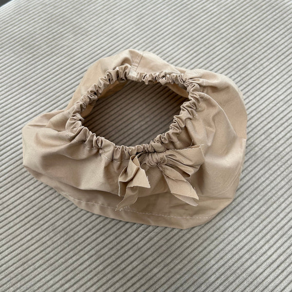 Strutskørt i beige med sløjfe