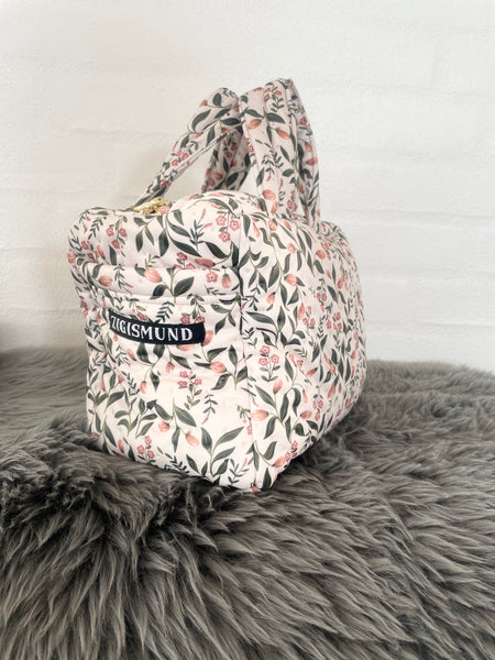 Makeup/toilettaske med smukke blomster i quilt