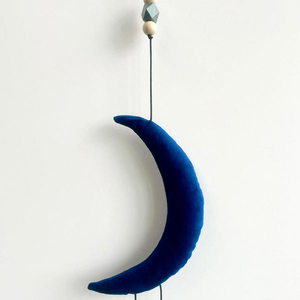 Uro med måne og stjerne i velour.