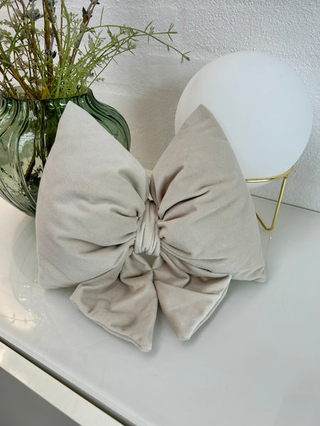 Lille sløjfe i råhvid velour.