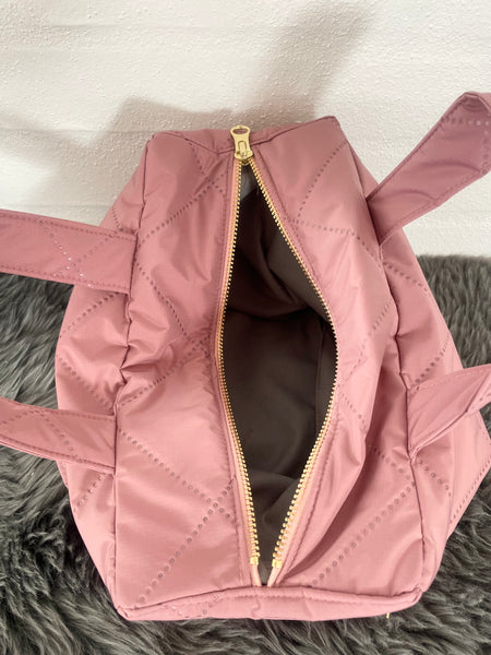 Makeup taske i skøn Rosa quilt og hanke.
