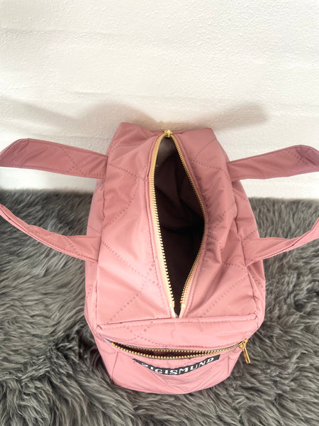 Makeup taske i skøn Rosa quilt og hanke.