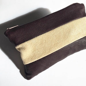 Lille clutch i plum og nude skind.