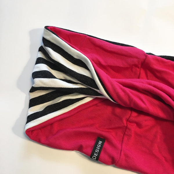 Pandebånd i striber og med pink jersey på bagsiden