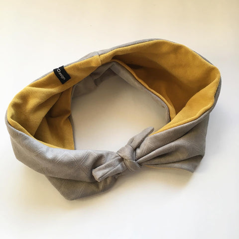 Pandebånd i fake ruskind og med karry Stretch